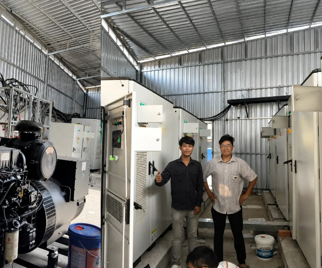 Parallel AINEGY solar-diesel BESS cabinets installed for a factory power project in Cambodia