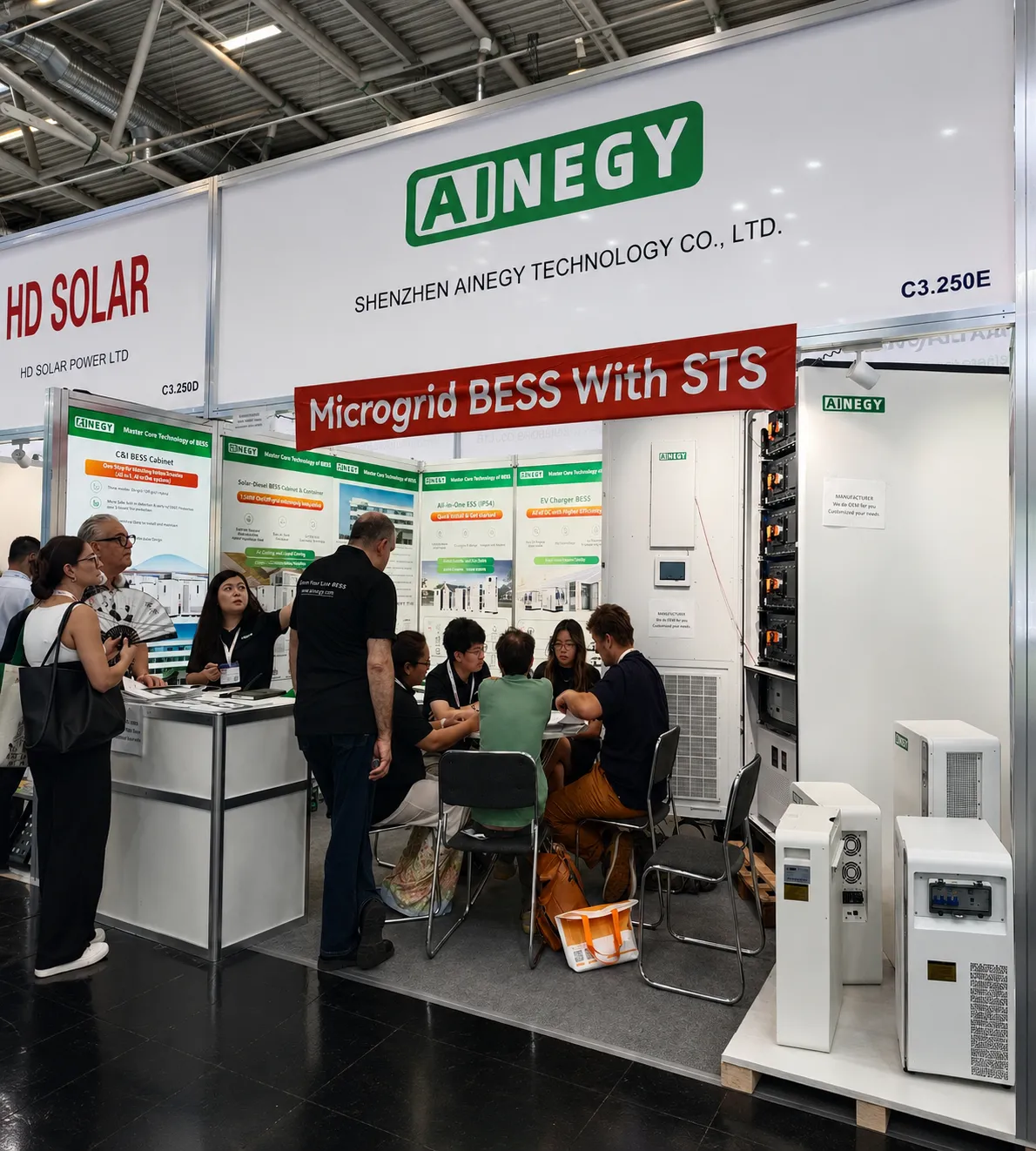 AINEGY project discussion with customers at an exhibition